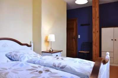 Ein Bett oder Betten in einem Zimmer der Unterkunft Haus Reuter 