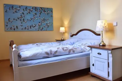 Ein Bett oder Betten in einem Zimmer der Unterkunft Haus Reuter 