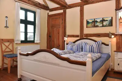 Ein Bett oder Betten in einem Zimmer der Unterkunft Haus Reuter 