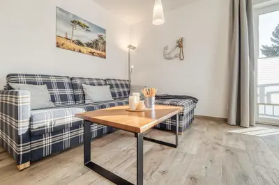 Ein Sitzbereich in der Unterkunft Haus Strandidyll - Suite Strandmuschel
