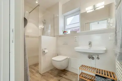 Ein Badezimmer in der Unterkunft Haus Strandidyll - Suite Strandmuschel