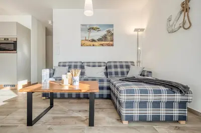 Ein Sitzbereich in der Unterkunft Haus Strandidyll - Suite Strandmuschel