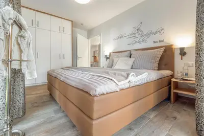 Ein Bett oder Betten in einem Zimmer der Unterkunft Haus Seestern - Suite Seeluft