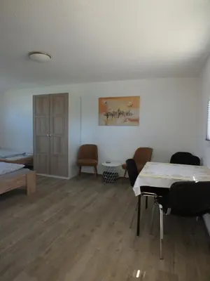 Ein Bett oder Betten in einem Zimmer der Unterkunft Ferienpark Buntspecht Apartment B