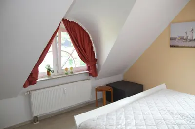Ein Bett oder Betten in einem Zimmer der Unterkunft Zeesenkoje
