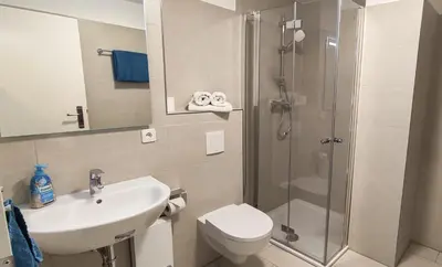 Ein Badezimmer in der Unterkunft Achtern Diek 8a - Wohnung 5