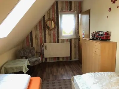 Ein Bett oder Betten in einem Zimmer der Unterkunft Ferienhaus Neumann - Ein ganzes Haus für Ihren Urlaub!