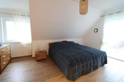 Ein Bett oder Betten in einem Zimmer der Unterkunft Fischlandhus 2 mein Lieblingsplatz