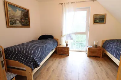 Ein Bett oder Betten in einem Zimmer der Unterkunft Fischlandhus 2 mein Lieblingsplatz
