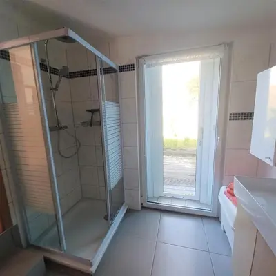 Ein Badezimmer in der Unterkunft Ferienhaus Dünenhaus