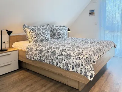 Ein Bett oder Betten in einem Zimmer der Unterkunft Möwennest Nr 5