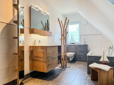 Ein Badezimmer in der Unterkunft Möwennest Nr 5