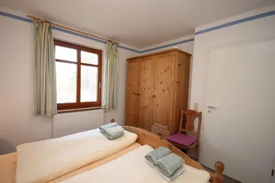 Ein Bett oder Betten in einem Zimmer der Unterkunft Strandhaus Jonathan 1