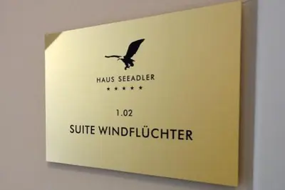 Ein Zertifikat, Auszeichnung, Logo oder anderes Dokument, das in der Unterkunft Residenz am Hafen Suite Windflüchter ausgestellt ist