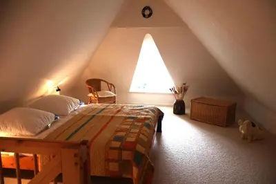 Ein Bett oder Betten in einem Zimmer der Unterkunft App 12, Holzerland