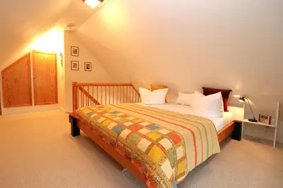 Ein Bett oder Betten in einem Zimmer der Unterkunft App 12, Holzerland