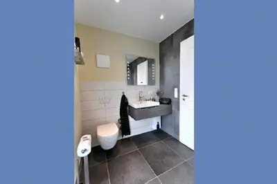 Ein Badezimmer in der Unterkunft Residenz am Hafen Suite Nordlicht