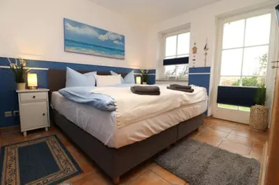 Ein Bett oder Betten in einem Zimmer der Unterkunft Birkenhof App 03