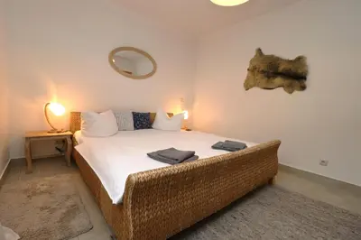 Ein Bett oder Betten in einem Zimmer der Unterkunft Birkenhof App 04, Ostseetraum