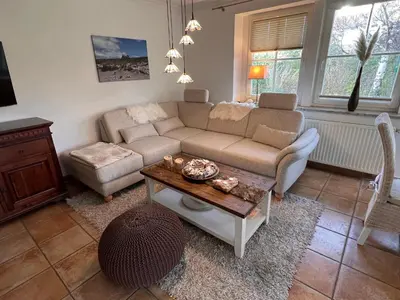 Ein Sitzbereich in der Unterkunft Birkenhof App 04, Ostseetraum