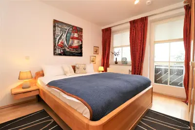 Ein Bett oder Betten in einem Zimmer der Unterkunft Birkenhof App 07, 
