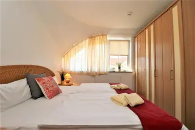 Ein Bett oder Betten in einem Zimmer der Unterkunft Birkenhof App 08