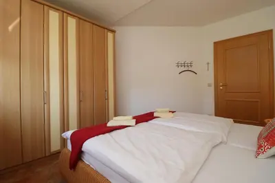 Ein Bett oder Betten in einem Zimmer der Unterkunft Birkenhof App 08