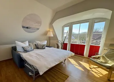 Ein Bett oder Betten in einem Zimmer der Unterkunft Birkenhof App 10, Schatzkammer