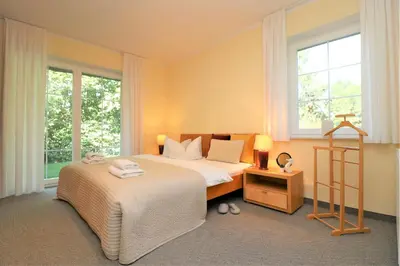 Ein Bett oder Betten in einem Zimmer der Unterkunft Güner Winkel Grüner Winkel, App 01