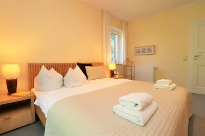 Ein Bett oder Betten in einem Zimmer der Unterkunft Güner Winkel Grüner Winkel, App 01