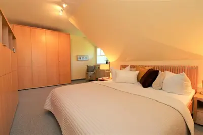 Ein Bett oder Betten in einem Zimmer der Unterkunft Güner Winkel Grüner Winkel, App 02