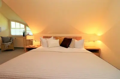 Ein Bett oder Betten in einem Zimmer der Unterkunft Güner Winkel Grüner Winkel, App 02