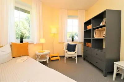Ein Bett oder Betten in einem Zimmer der Unterkunft Güner Winkel Grüner Winkel, App 02