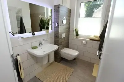 Ein Badezimmer in der Unterkunft Ferienhäuser Ferienhaus, Uns Boddenhuesing