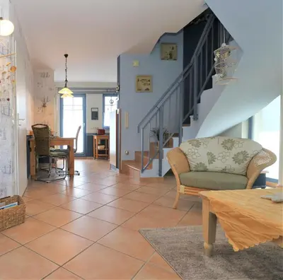 Ein Sitzbereich in der Unterkunft Ferienhäuser Uns Lütt Hus