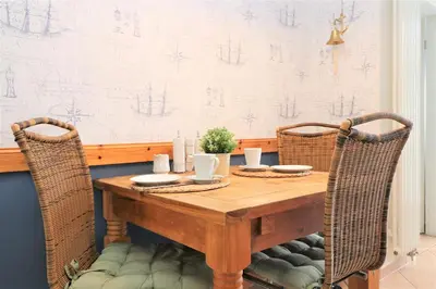 Ein Sitzbereich in der Unterkunft Ferienhäuser Uns Lütt Hus