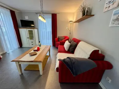 Ein Sitzbereich in der Unterkunft Aquamarin Ostseetraumsuite 01