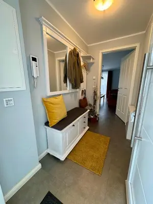 Ein Bett oder Betten in einem Zimmer der Unterkunft Aquamarin Ostseetraumsuite 01
