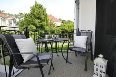Ein Balkon oder eine Terrasse in der Unterkunft Aquamarin Ostseetraumsuite 02
