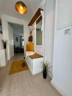 Ein Bett oder Betten in einem Zimmer der Unterkunft Aquamarin Ostseetraumsuite 05