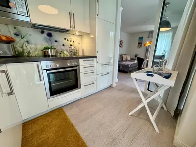 Küche/Küchenzeile in der Unterkunft Aquamarin Ostseetraumsuite 05