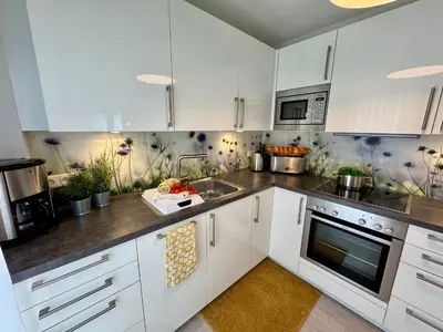 Küche/Küchenzeile in der Unterkunft Aquamarin Ostseetraumsuite 05