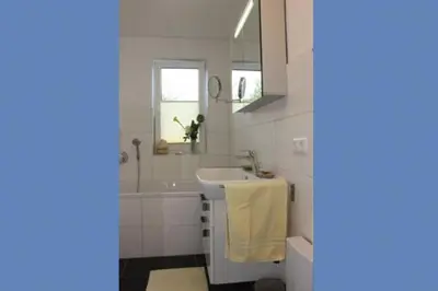 Ein Badezimmer in der Unterkunft Aquamarin Ostseetraumsuite 08