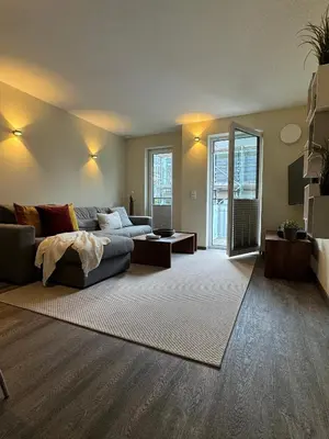 Ein Bett oder Betten in einem Zimmer der Unterkunft Aquamarin Ostseetraumsuite 09