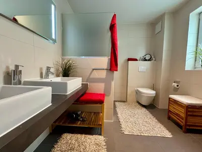 Ein Badezimmer in der Unterkunft Aquamarin Ostseetraumsuite 09
