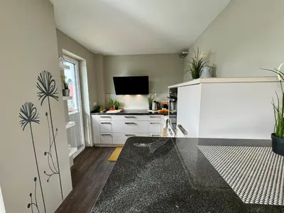 Küche/Küchenzeile in der Unterkunft Aquamarin Ostseetraumsuite 10