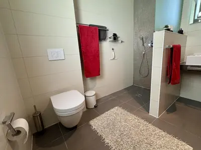 Ein Badezimmer in der Unterkunft Aquamarin Ostseetraumsuite 10