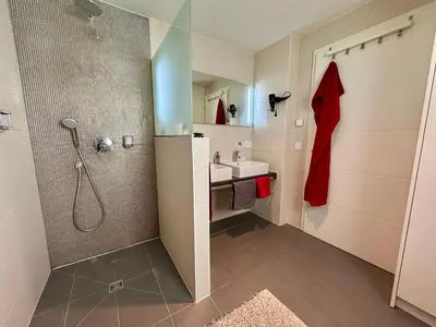 Ein Badezimmer in der Unterkunft Aquamarin Ostseetraumsuite 10