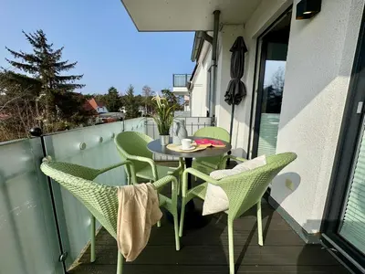 Ein Sitzbereich in der Unterkunft Aquamarin Ostseetraumsuite 10