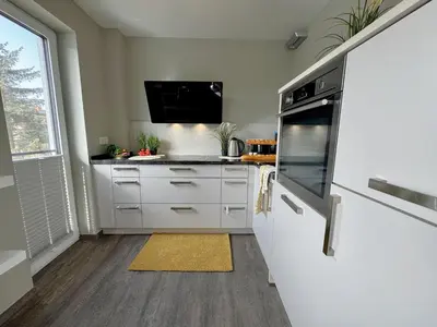 Küche/Küchenzeile in der Unterkunft Aquamarin Ostseetraumsuite 10